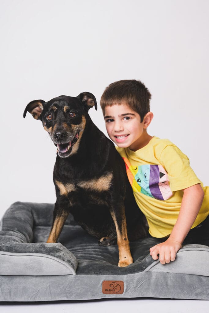Cora the dog and her favorite human in styled studio setup in Sausalito