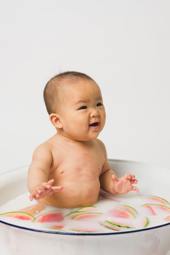 One-year milestone session in milk bath in Marin studio