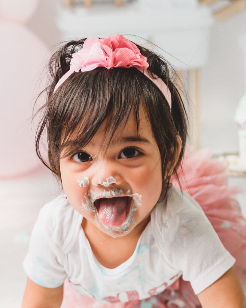 Playful toddler portrait during birthday shoot in Marin