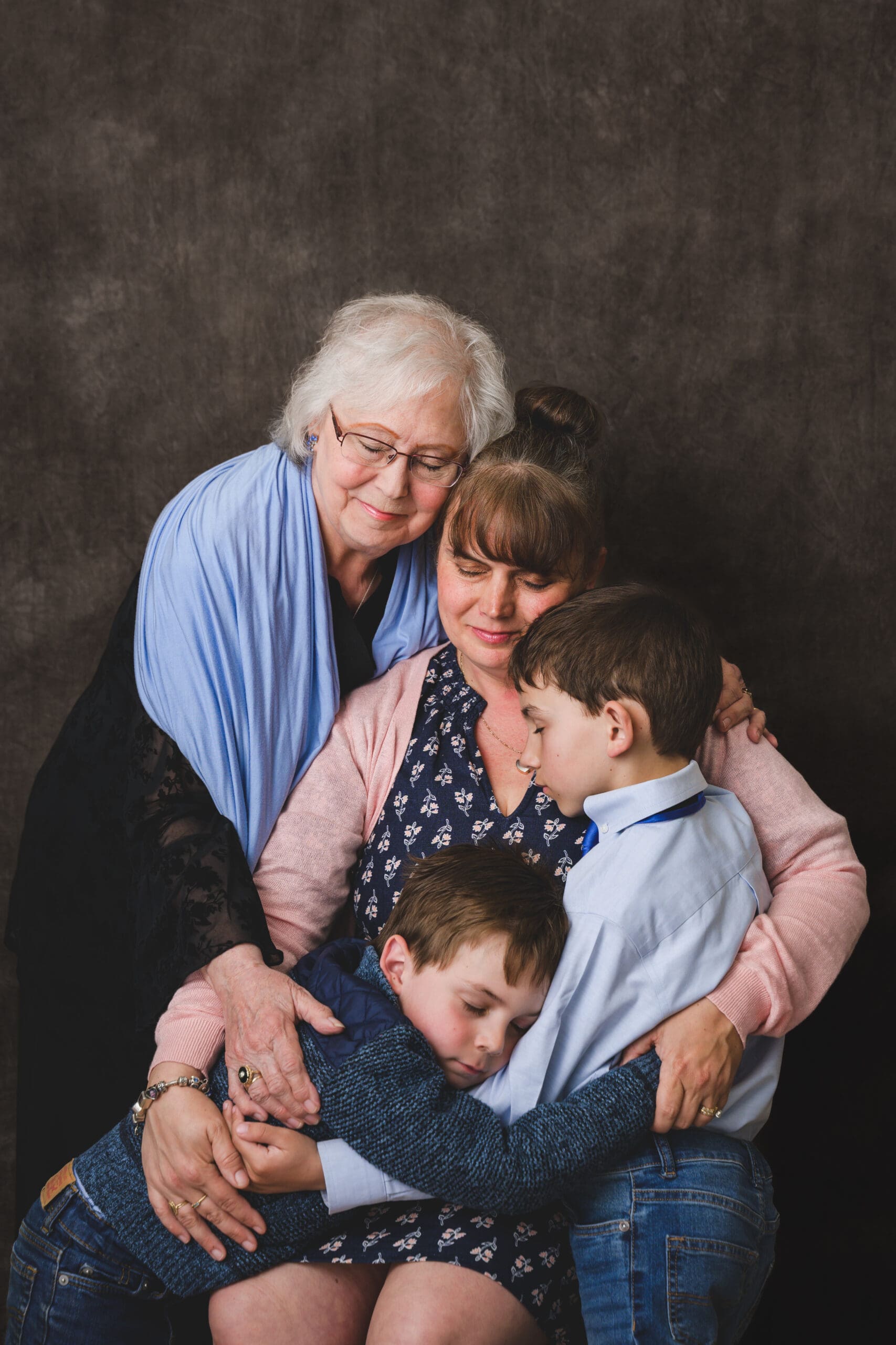 Grandparents, parents, and grandchildren studio portrait