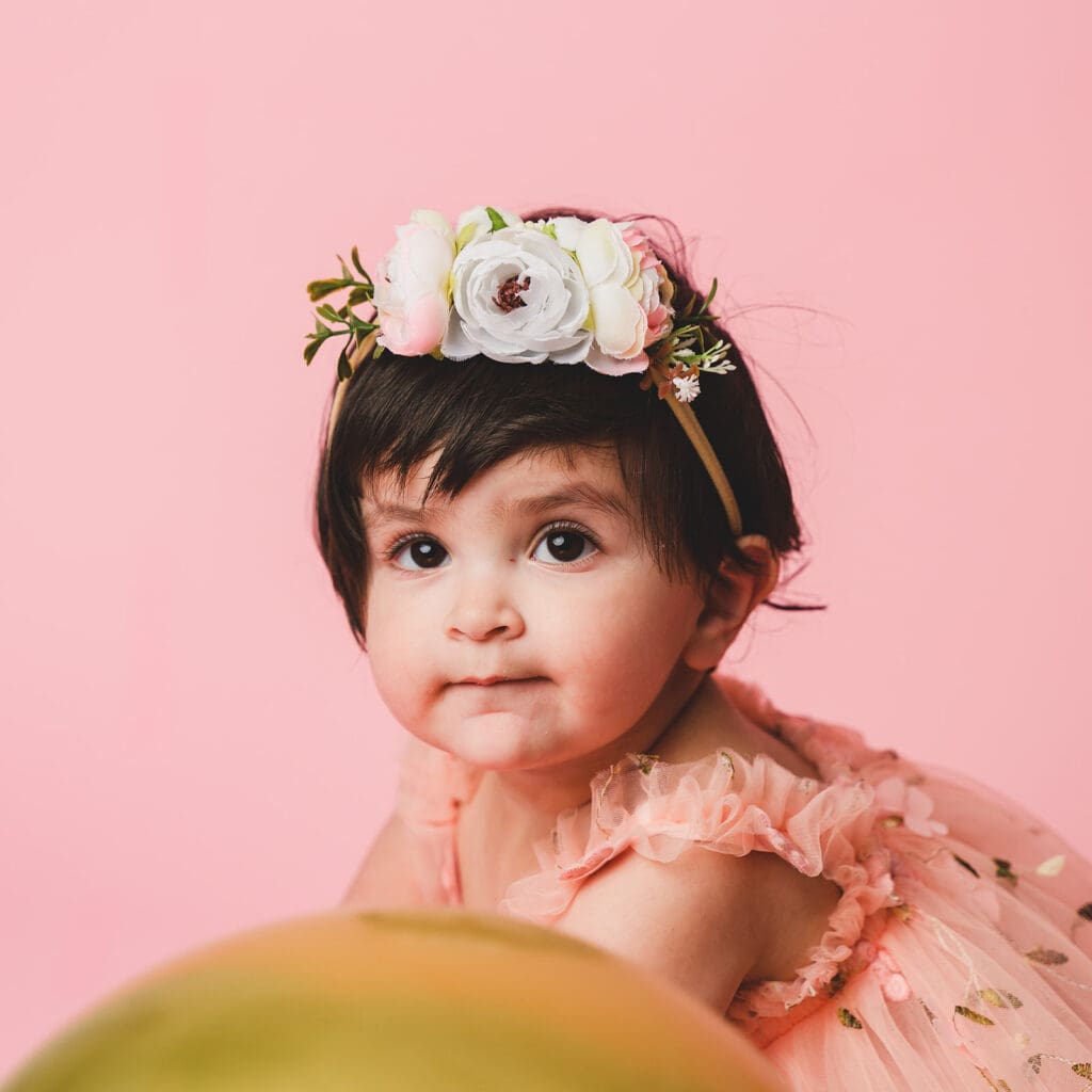 One-year-old in birthday crown at Sausalito studio