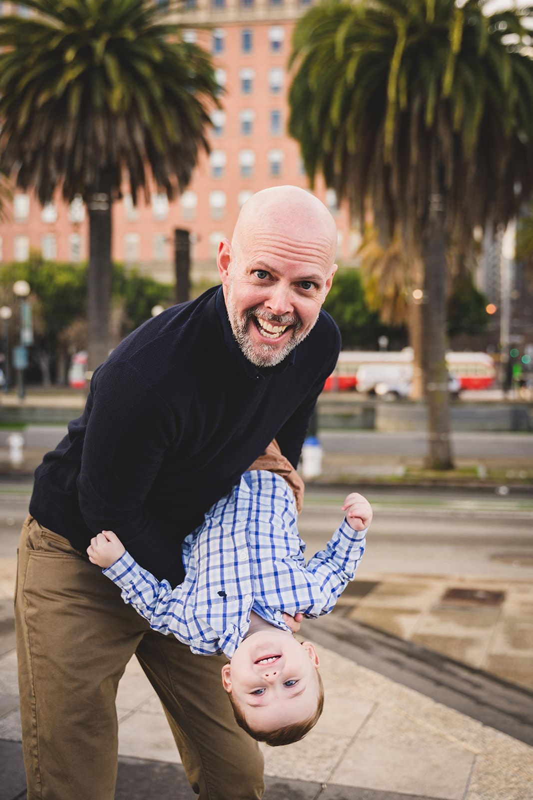  Family photos at the San Francisco Ferry Building with three young children playing along the Embarcadero | Mini Anna Photography