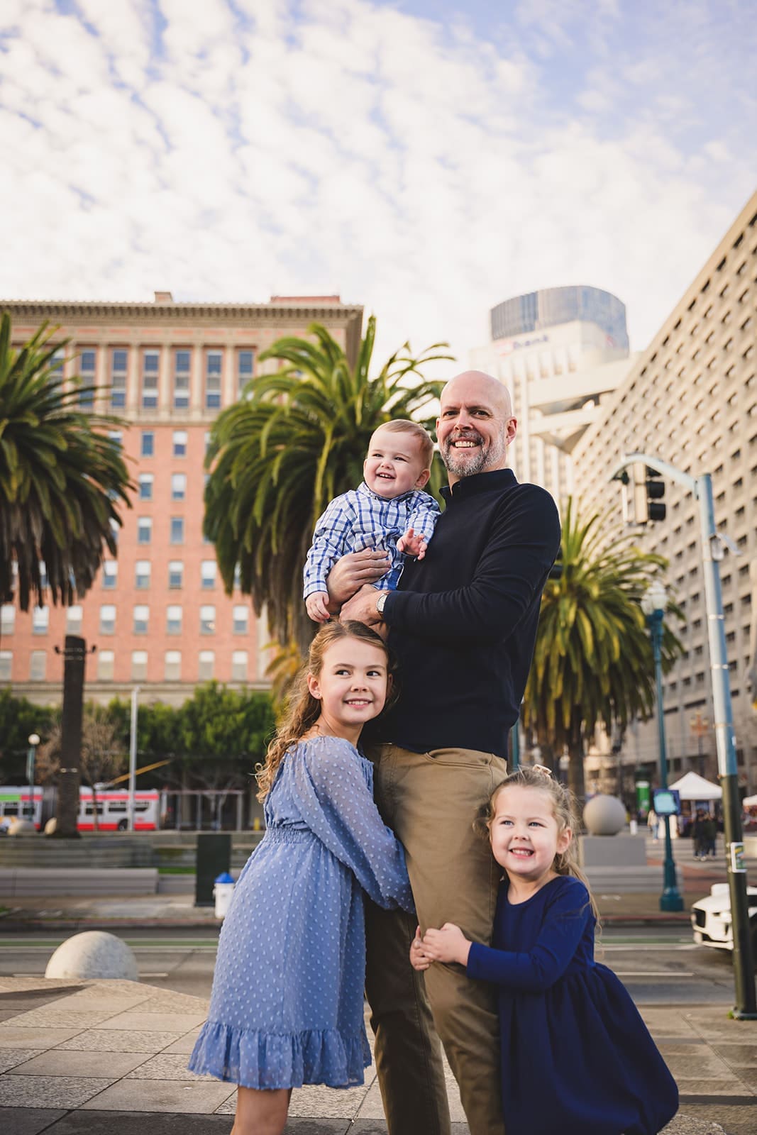  Family photos at the San Francisco Ferry Building with three young children playing along the Embarcadero | Mini Anna Photography