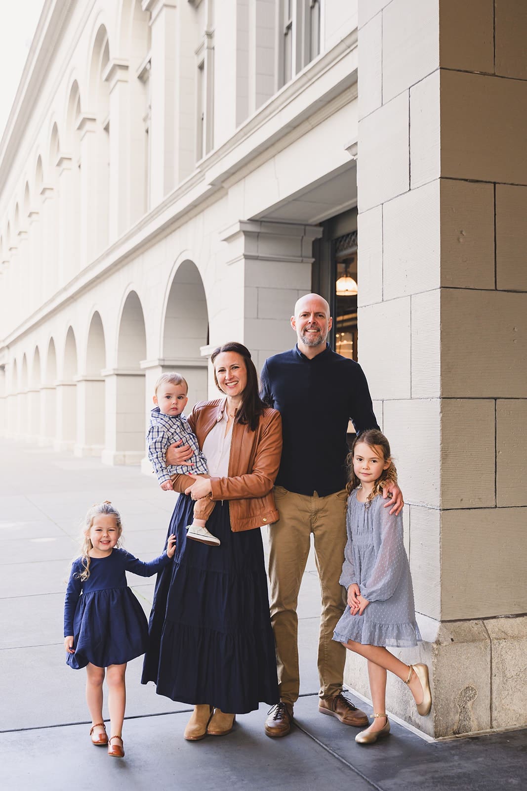  Family photos at the San Francisco Ferry Building with three young children playing along the Embarcadero | Mini Anna Photography