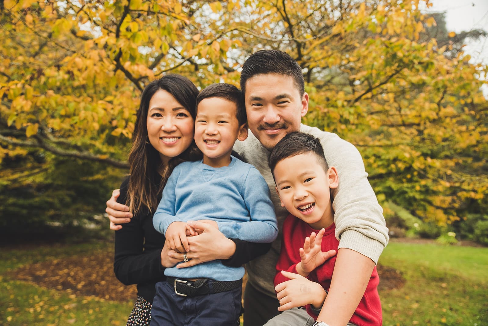 Family photography session at San Francisco Botanical Garden with lush greenery and kids exploring garden paths
